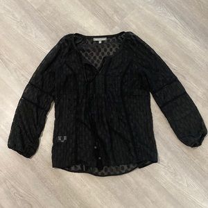 Sheer black blouse